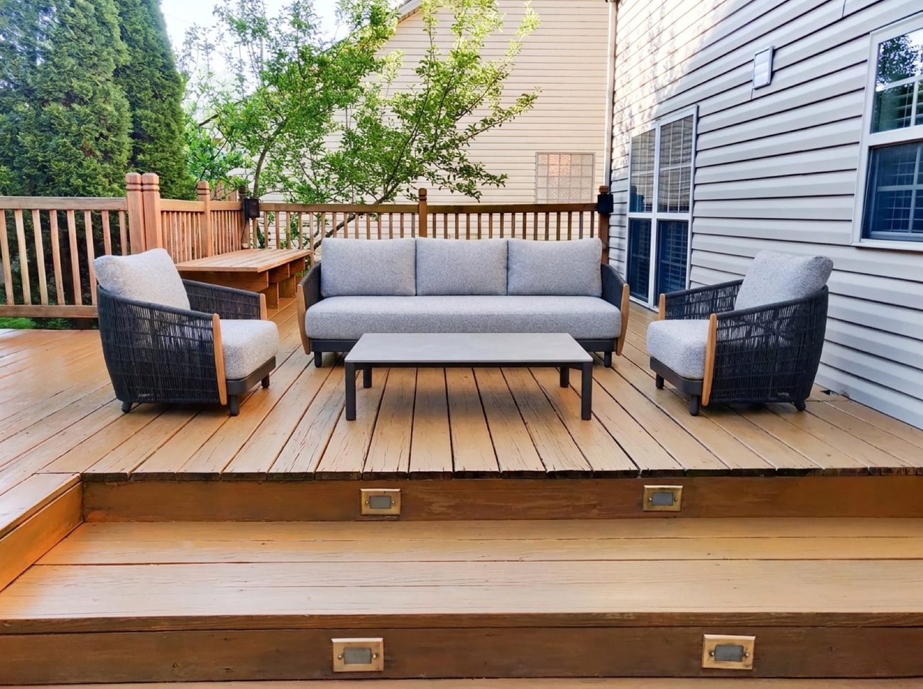 The same deck with a four piece lounge set placed on it